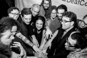 People huddling together for a cheer spirit