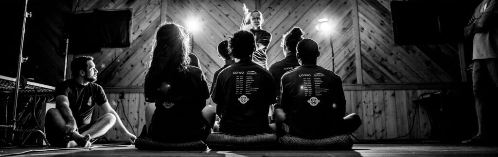 People sitting watching a presentation