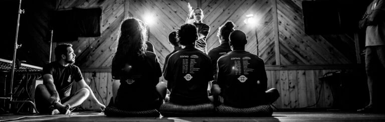 People sitting watching a presentation